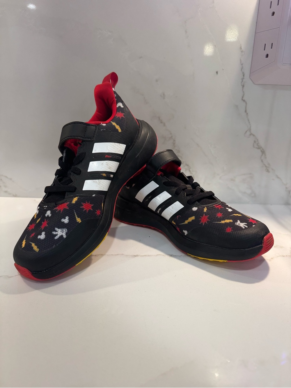 adidas x disney Kids Black Sneakers with White Stripes and Red & Yellow Accents